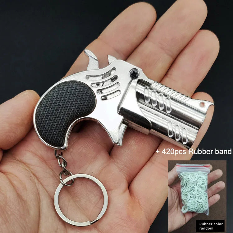 Mini Rubber Band Rifle Sprayer 8 Bursts Rubber Toy Gun Miniature Alloy Pistol Model Ornaments Toy Gun For Boys Chrismas gift
